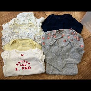 8 gently used baby onsies